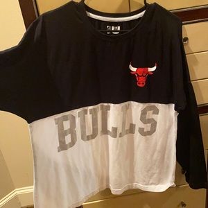 Large Chicago Bulls 2 tone black/white with bulls logo on the left heart are.